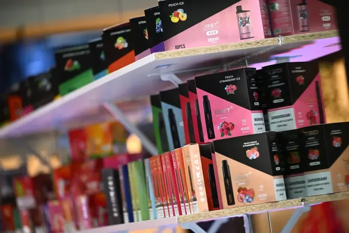 An empty display shelf in an Australian convenience store or corner shop where vapes used to be sold.
