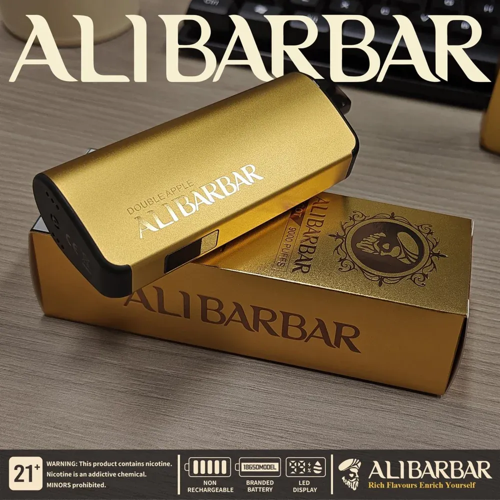 A close-up shot of an Alibarbar Ingot 9000 vape device showing its subtle, integrated LED display with a soft glow.