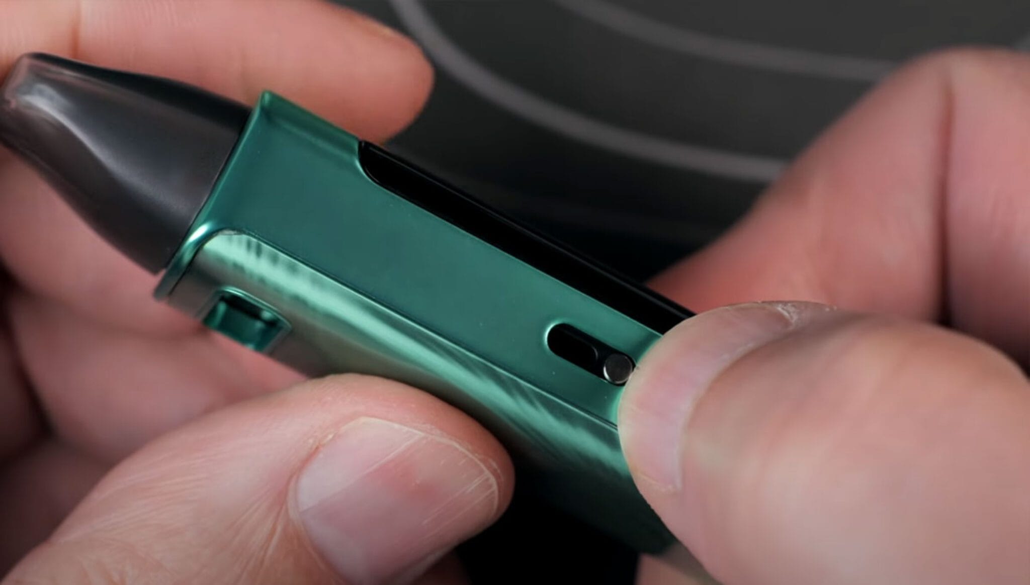 A vape device showing signs of malfunction like smoke, extreme heat, or damage, representing a safety hazard.