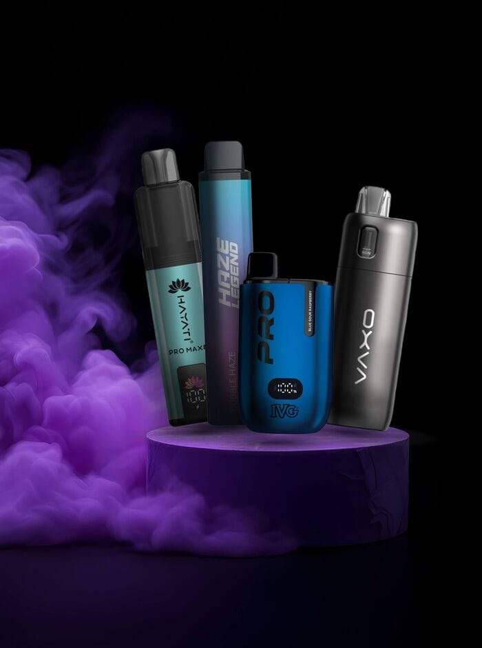 A close-up shot of a disposable vape with its LED indicator light illuminated with a continuous solid glow, signifying active charging status.