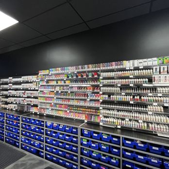 A person looking frustrated while staring at an empty vape flavour shelf or a