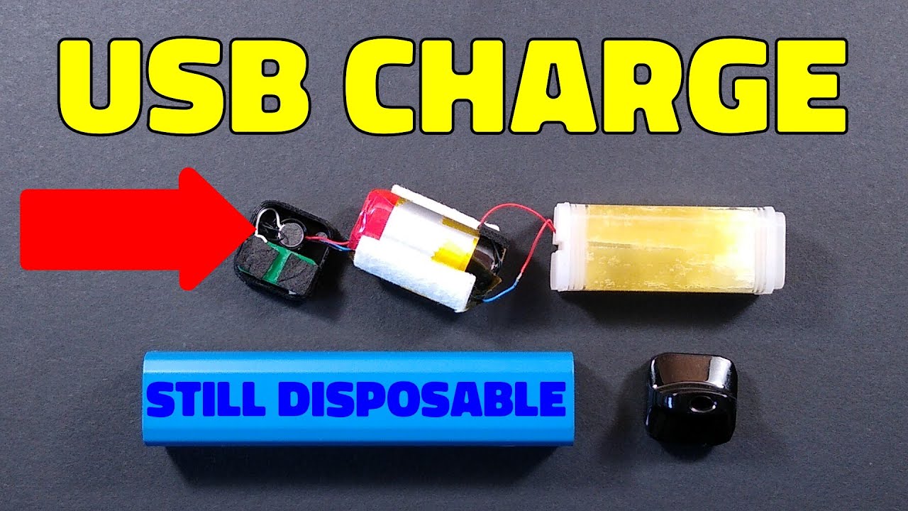 A hand plugging a USB-C cable into the charging port of a disposable vape, indicating the device is being charged.