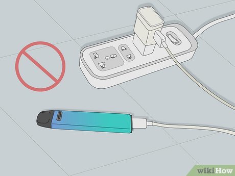 A vape pod system or rechargeable disposable device connected to a low-output USB charger, illustrating the act of slow charging.